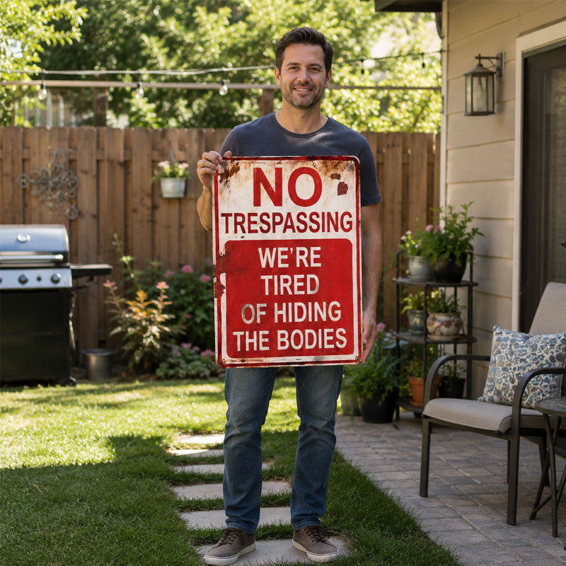 No Trespassing—We're Tired of Hiding Bodies (Metal Sign)