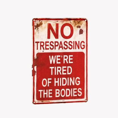 No Trespassing—We're Tired of Hiding Bodies (Metal Sign)