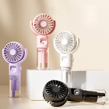 💧 Portable Rechargeable Handheld Misting Fan – USB charging & 3 speeds – Cools with fine mist – perfect for summer outings or travel 🌬️✨
